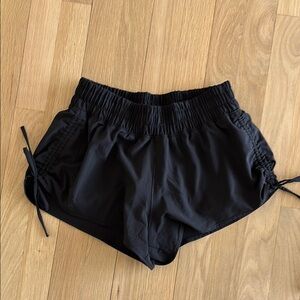 Black Athletic Shorts with Elastic Waistband and Side Ties